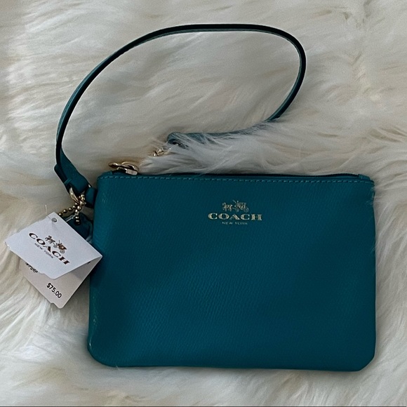Coach Handbags - Coach wristlet cadet blue NWT